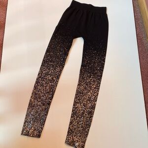 Shiny black with gold leggings